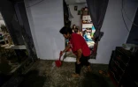 La cuisine inondée dans la maison de la famille Tamayo sur l'île de Pugad, dans la province de Bulacan, le 21 août 2025 aux Philippines