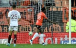La joie de l'attaquant burkinabé de Lorient Dango Ouattara, après avoir marqué l'unique but dans le temps additionnel face à Metz, lors de la 33e journée de Ligue 1, le 20 avril 2022 au Stade du Moustoir
