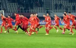 La joie des joueurs de la Macédoine du nord, après avoir battu l'Islande, 3-1, lors des éliminatoires de la Coupe du monde 2022 au Qatar, le 14 novembre 2021 à Skopje
