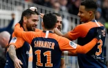 L'attaquant de Montpellier Andy Delort (g) buteur félicité par ses coéquipiers contre Saint-Etienne, le 9 février 2020 au stade de la Mosson à Montpellier   