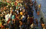 Des hindous se baignent dans les eaux du Gange à Haridwar (Inde) le 11 mars 2021