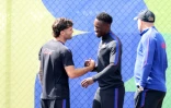 Folarin Balogun (au centre) avec Christian Pulisic (à gauche) lors d'une séance d'entraînement de l'équipe des Etats-Unis le 5 juillet 2026 à l'Université de l'Etat de Washington, à Seattle
