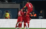 La joie des joueurs de Liverpool, après le 3e but marqué par l'attaquant sénégalais Sadio Mané (c), sur le terrain de Villareal, lors de la demi-finale retour de la Ligue des Champions, le 3 mai 2022