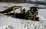 Des militaires ukrainiens de la 18e brigade de Sloviansk de la Garde nationale d'Ukraine participent à un entraînement dans un lieu tenu secret de la région de Donetsk, le 28 janvier 2026