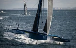 Tom Laperche sur son trimaran SVR - Lazartigue, lors du départ de l'Ultim Challenge, le 7 janvier 2024 à Brest