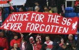 Des supporters de Liverpool réclament justice pour les 96 victimes du drame de  Hillsborough, lors d'un déplacement à Reading le 13 avril 2013