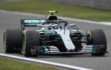 Le Finlandais Valtteri Bottas au volant de sa Mercedes lors des qualifications pour le GP de Chine, sur le circuit de Shanghai, le 14 avril 2018