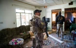Des soldats des forces spéciales irakiennes lors de la fouille d'une maison le 8 novembre 2016 à Mossoul 