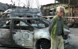 Voitures calcinées par un incendie dans le village de Tighremt, dans le nord-est de l'Algérie, le 25 juillet 2023 