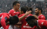 La joie des Monégasques, après l'ouverture du score par leur attaquant Wissam Ben Yedder (c), contre Saint-Etienne, lors de la 34e journée de Ligue 1, le 23 avril 2022 au Stade Geoffroy-Guichard
