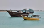 Des lenjs, bateaux traditionnels iraniens, flottent près de l'île touristique iranienne de Qeshm, dans le Golfe, le 29 avril 2023