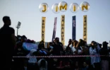 Des fans de BTS attendent d'apercevoir Jimin et Jungkook, deux membres du groupe qui ont été libérés de leur service militaire, dans le comté de Yeoncheon en Corée du Sud, le 11 juin 2025