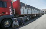 Des chauffeurs de camion iraniens attendent de pouvoir repasser la frontière iranienne dans le district de Penjwen, près de la frontière avec l'Iran, dans la région autonome du Kurdistan irakien, le 21 septembre 2026