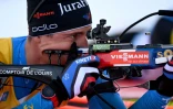 Le Français Quentin Fillon Maillet, sur le pas de tir, lors de sa victoire dans le sprint de Ruhpolding, comptant pour la Coupe du monde de biathlon, le 13 janvier 2022