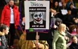 Un manifestant tient une pancarte caricaturant Boris Johnson en Joker lors d'une manifestation en marge de la Conférence annuelle des conservateurs à Manchester le 3 octobre 2021