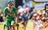 Le maillot vert, le Belge Wout Van Aert, jubile sur la ligne d'arrivée, le 21 juillet 2022 à Hautacam, après avoir terminé 3e de la 18e étape remportée par son équipier, le maillot jaune danois Jonas Vingegaard