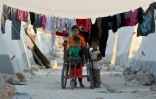 Des enfants dans un camp de déplacés dans la province syrienne d'Idleb, près de la frontière turque, le 26 août 2018