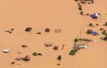 Photo tirée d'une vidéo de la chaîne ABC Laos montrant une vue aérienne des inondations provoquées par l'effondrement d'un barrage dans la province d'Attapeu (sud-est du Laos) 