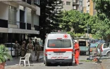 Des blessés sont évacués après des heurts à Beyrouth, le 14 octobre 2021