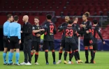 Les joueurs de Liverpool fĂŞtent leur victoire Ă l'issue du match de groupes de la Ligue des champions face l'Ajax, Ă Amsterdam, le 21 octobre 2020