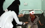 Un enfant soigné dans un hôpital après une frappe qui a tué 29 enfants et blessé d'autres dans le nord du Yémen le 9 août 2018