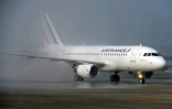 Un Airbus A319 d'Air France à l'atterrissage le 18 mars 2015 à l'aéroport Roissy Charles de Gaulle