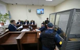 Le sergent russe Vadim Chichimarine (D), 21 ans, lors de son procès à Kiev le 19 mai 2022 pour crime de guerre
