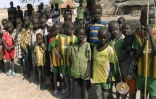 Des enfants attendent une distribution alimentaire du PAM dans un camp de déplacés de l'Etat de Jonglei, le 13 février 2016