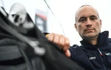 Le skipper français Fabrice Amadeo à bord de son monocoque Imoca "Naxans-Wewise" sur le site de départ de la 10e édition du Vendée Globe autour du monde en solitaire, le village du Vendée Globe, aux Sables-d'Olonne, le 6 novembre 2024