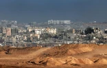Des bâtiments détruits dans le secteur nord de la bande de Gaza vus depuis le côté israélien de la frontière, le 29 mai 2025