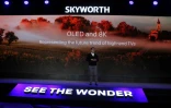 Skyworth chief executive Tony Wang unveils premium 8K TV models at the Consumer Electronics Show 