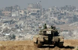 Un char israélien face aux destructions dans la bande de Gaza, le 19 janvier 2024