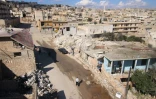Des maisons détruites après un bombardement, le 7 octobre 2015 à Darat Azzah, à l'ouest de la ville d'Alep, en Syrie