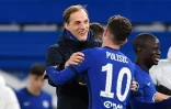 L'entraîneur de Chelsea Thomas Tuchel et le milieu de terrain Christian Pulisic se congratulent après la qualification pour les quarts finale de la Ligue des champions, le 17 mars à Stamford Bridge