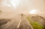Une route touchée par la coulée de lave du volcan Nyiragongo, près de Goma, le 23 mai 2021 en RDC