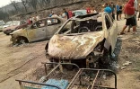 Photo diffusée sur la page Facebook de la Radio Soummam Bejaia, le 24 juillet 2023, montrant des véhicules calcinés après des incendies de forêts à Toudja, en Algérie