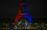 Le mot "Magique" sur la Tour Eiffel illuminée aux couleurs du Paris SG après sa victoire en finale de la Ligue des champions, le 31 mai 2025 à Paris