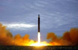 Photo prise le 29 août 2017 et fournie le 30 août par l'agence officielle nord-coréenne KCNA d'un tir de missile Hwasong-12 dans un endroit non précisé