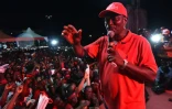 Samura Kamara, candidat du parti au pouvoir à la présidence du Sierra Leone, l'APC, en campagne électorale à Mekeni, le 5 mars 2018
