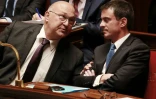 Le ministre de l'Economie et des Finances Michel Sapin et le Premier ministre Manuel Valls le 13 juillet 2016 à l'Assemblée nationale à Paris