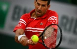 Le Serbe Novak Djokovic, lors de son match du 1er tour contre l'Américain Tennys Sandren, aux Internationaux de France, le 1er juin 2021 au stade de Roland Garros à Paris