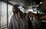 Vérification de la température pour dépister Ebola à l'entrée en République démocratique du Congo à Goma le 16 juillet 2019