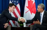 Le Premier ministre canadien Justin Trudeau (G) et le président américain Barack Obama se serrent la main lors d'un sommet à Lima le 20 novembre 2016