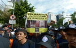 Des musulmans indonésiens manifestent près du tribunal où est jugé pour blasphème le gouverneur chrétien de Jakarta Basuki Tjahaja Purnama, surnommé "Ahok", à Jakarta le 13 décembre 2016