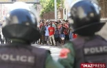 Mardi 27 Janvier 2008

Antananarivo les gendarmes malgaches repoussent la population place du 13 mai pour éviter les pillages