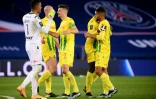 La joie des Nantais, après leur victoire, 2 buts à 1 face au Paris Saint-Germain, lors de leur match de L1, le 14 mars 2021 au Parc des Princes
