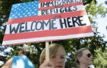 "Les immigrés et les réfugiés sont les bienvenus": un jeune manifestant, le 30 juin 2018 à Washington