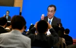 Le Premier ministre Li Keqiang lors d'une conférence de presse virtuelle, au Grand Palais du Peuple à Pékin le 11 mars 2021, à l'occasion de la clôture de l’Assemblée nationale populaire