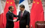 Emmanuel Macron et le président chinois Xi Jinping se serrent la main après une conférence de presse au Palais du peuple à Pékin, le 9 janvier 2018