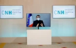 Emmanuel Macron participe, par vidéoconférence, , à la Conférence nationale humanitaire, réunie le 17 décembre au ministère des Affaires étrangères
